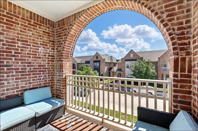balcony featuring a residential view