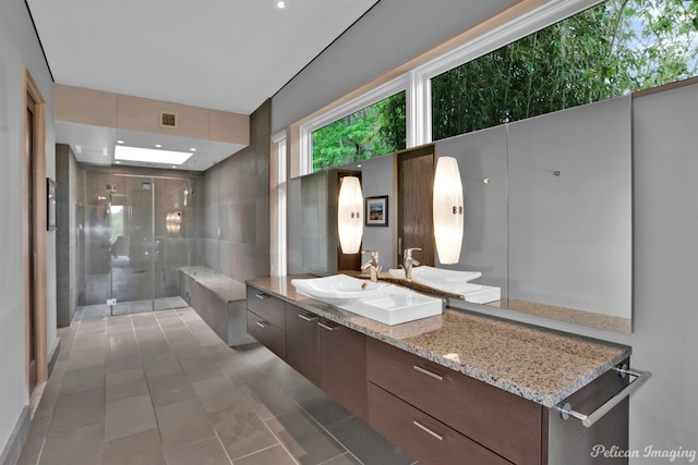 613 Moore Rd, Elm Grove, LA 71051 - bathroom featuring a stall shower, vanity, and tile patterned floors