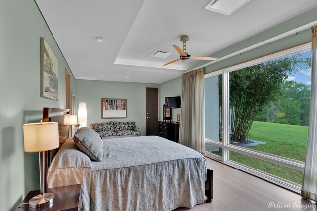 613 Moore Rd, Elm Grove, LA 71051 - bedroom with wood finished floors and a ceiling fan