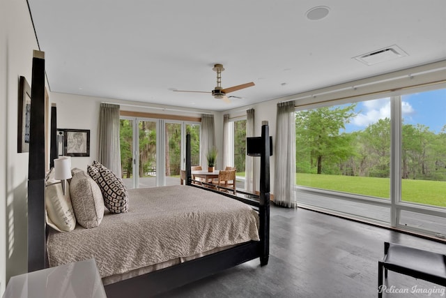 613 Moore Rd, Elm Grove, LA 71051 - bedroom featuring multiple windows and wood finished floors