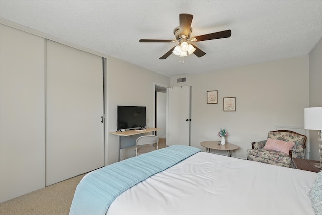 2700 Stonehaven Ct, Irving, TX 75038 - carpeted bedroom with a textured ceiling and baseboards