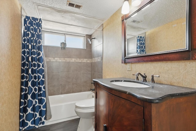 2700 Stonehaven Ct, Irving, TX 75038 - bathroom featuring baseboards, wood finished floors, a textured ceiling, and vanity