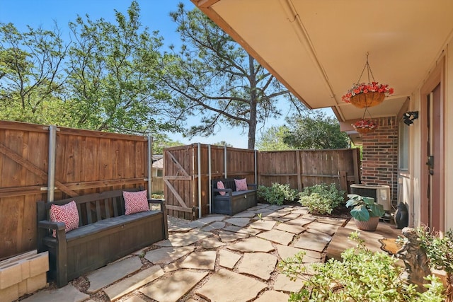 2700 Stonehaven Ct, Irving, TX 75038 - view of patio / terrace featuring a fenced backyard and central AC unit