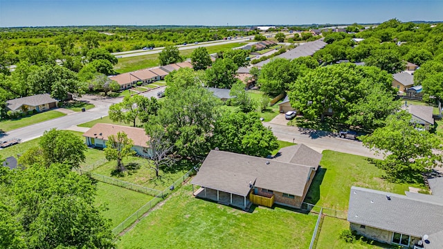 birds eye view of property with a residential view