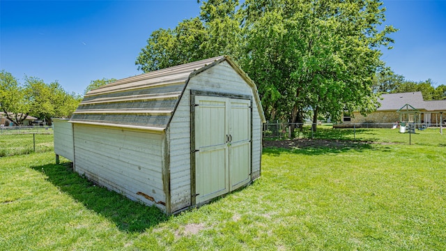 view of shed featuring a fenced backyard
