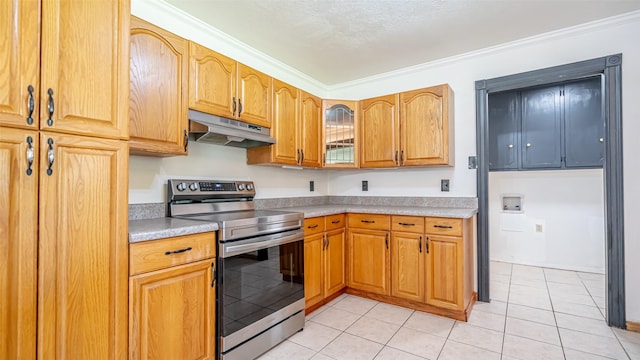 kitchen with glass insert cabinets, under cabinet range hood, light countertops, stainless steel electric range, and light tile patterned flooring