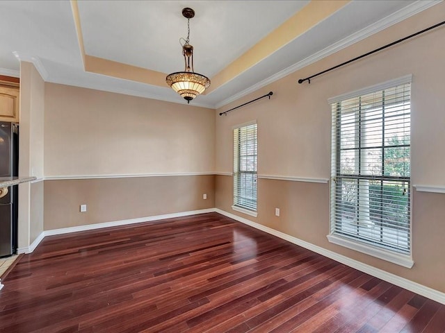 1904 Loblolly Ln, Lufkin, TX 75904 - unfurnished room featuring wood finished floors, baseboards, crown molding, and a raised ceiling
