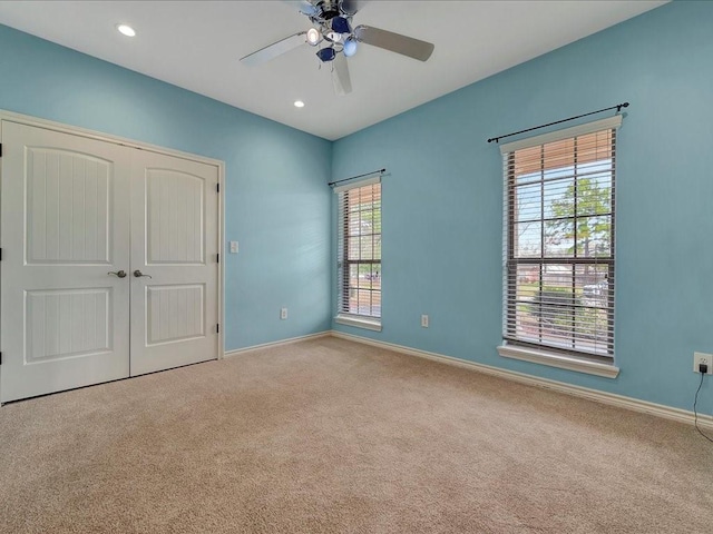 1904 Loblolly Ln, Lufkin, TX 75904 - unfurnished bedroom with carpet, multiple windows, baseboards, and recessed lighting