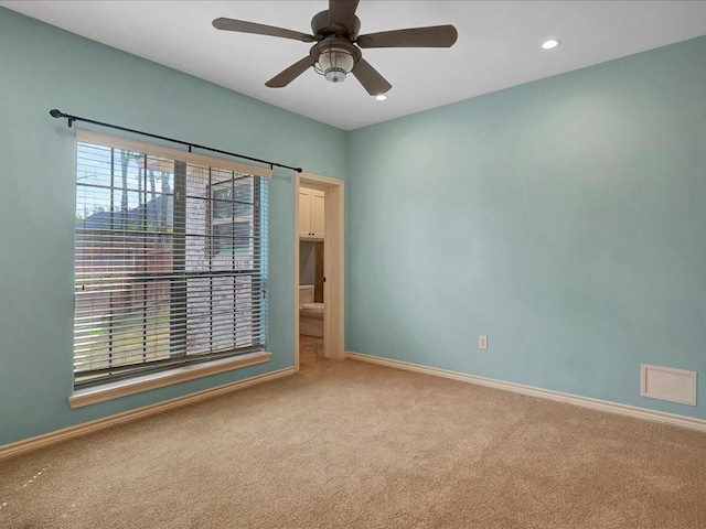 1904 Loblolly Ln, Lufkin, TX 75904 - spare room featuring carpet floors, baseboards, ceiling fan, and recessed lighting