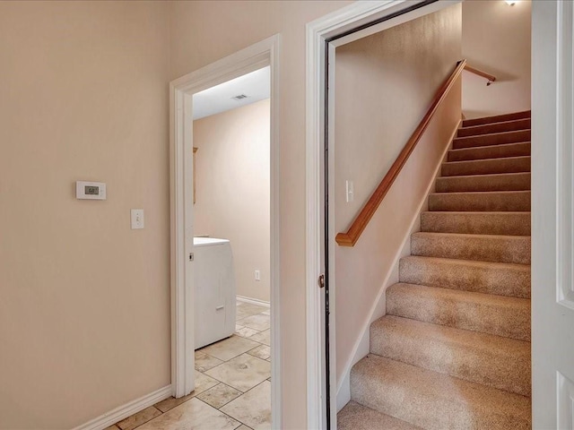 1904 Loblolly Ln, Lufkin, TX 75904 - stairs with baseboards and washer / dryer