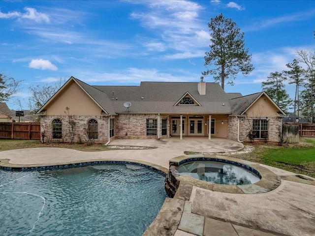 1904 Loblolly Ln, Lufkin, TX 75904 - view of pool featuring a patio, fence, an in-ground hot tub, and french doors