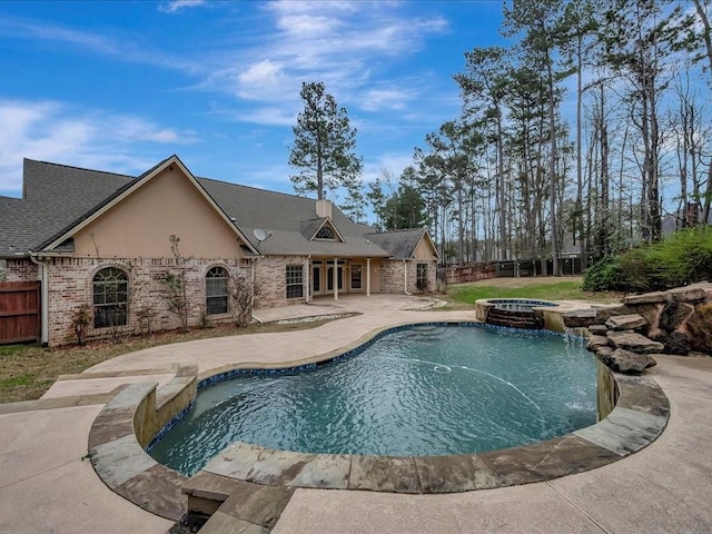 1904 Loblolly Ln, Lufkin, TX 75904 - view of pool with a fenced backyard, a patio, and a pool with connected hot tub