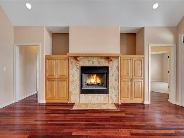 1904 Loblolly Ln, Lufkin, TX 75904 - unfurnished living room with dark wood finished floors, a fireplace, baseboards, and recessed lighting