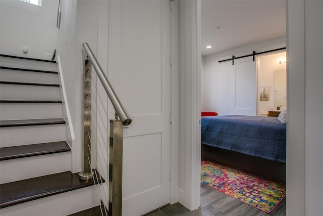 2239 Lovedale Ave Unit 105, Dallas, TX 75235 - staircase with a barn door and recessed lighting