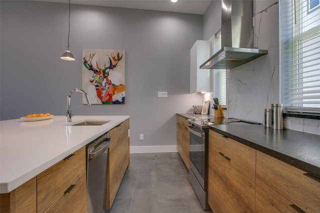 2239 Lovedale Ave Unit 105, Dallas, TX 75235 - kitchen with modern cabinets, a sink, appliances with stainless steel finishes, and wall chimney exhaust hood