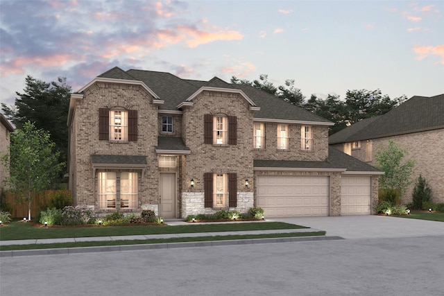 view of front of house with brick siding, concrete driveway, a garage, and a shingled roof