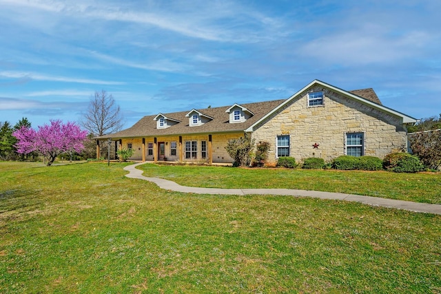 4489 E Fm 120, Denison, TX 75021 - view of front of property featuring a shingled roof, a front yard, and stone siding