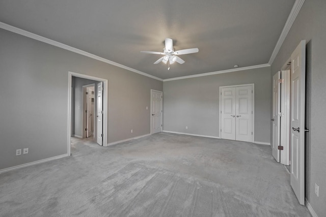 4489 E Fm 120, Denison, TX 75021 - unfurnished bedroom featuring ornamental molding, carpet floors, baseboards, and ceiling fan