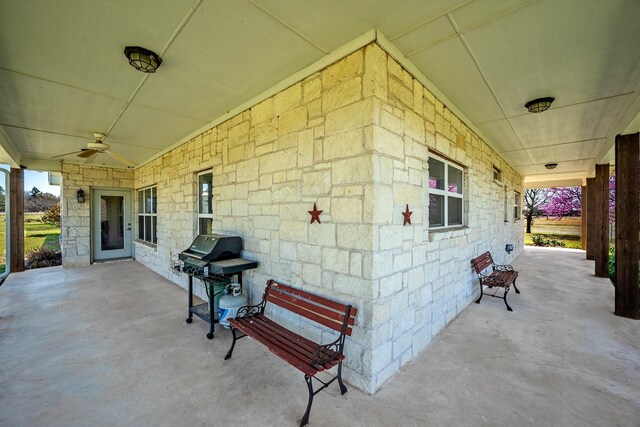 4489 E Fm 120, Denison, TX 75021 - view of patio featuring grilling area and a ceiling fan