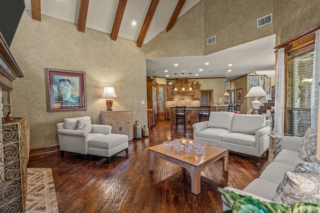 living area featuring high vaulted ceiling, dark wood-style floors, recessed lighting, and beamed ceiling