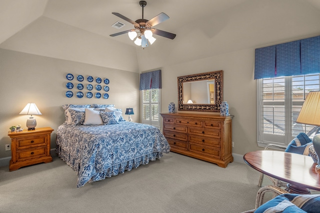 bedroom featuring carpet, lofted ceiling, ceiling fan, and baseboards
