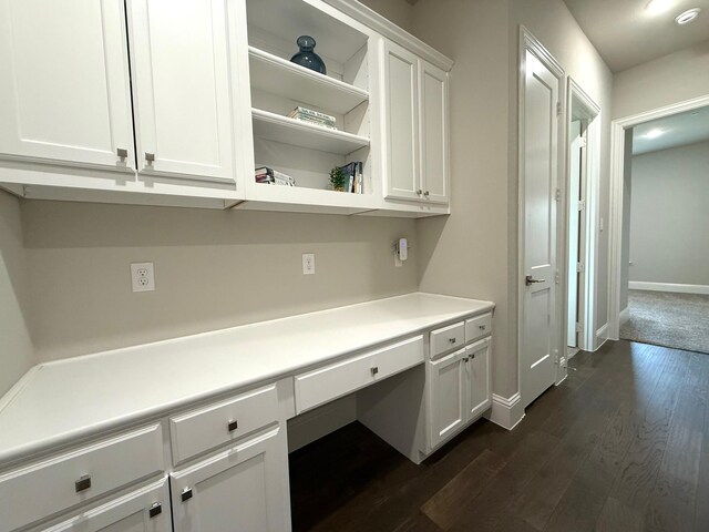 1040 Sugar Bars Dr, Lucas, TX 75002 - unfurnished office with built in study area, dark wood-style floors, and baseboards