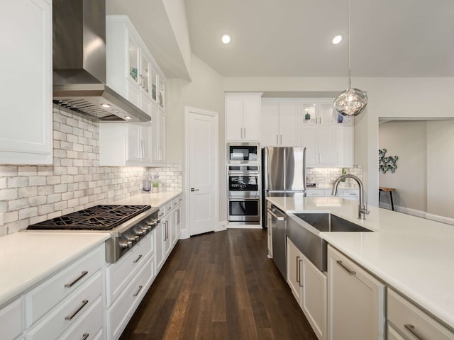 1040 Sugar Bars Dr, Lucas, TX 75002 - kitchen featuring wall chimney exhaust hood, stainless steel appliances, a sink, white cabinets, and light countertops