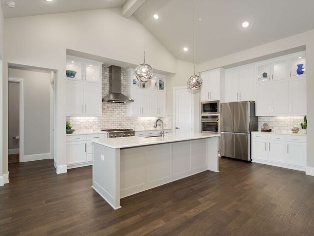 1040 Sugar Bars Dr, Lucas, TX 75002 - kitchen with wall chimney range hood, appliances with stainless steel finishes, a sink, light countertops, and beamed ceiling