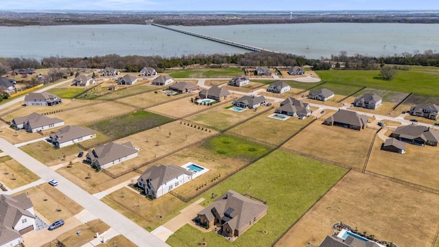 1040 Sugar Bars Dr, Lucas, TX 75002 - aerial perspective of suburban area featuring a large body of water