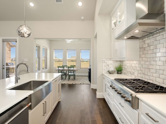 1040 Sugar Bars Dr, Lucas, TX 75002 - kitchen featuring wall chimney range hood, stainless steel appliances, a sink, light countertops, and recessed lighting