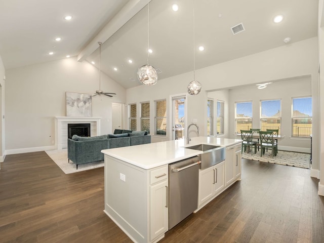 1040 Sugar Bars Dr, Lucas, TX 75002 - kitchen featuring dishwasher, a sink, beam ceiling, dark wood-style flooring, and white cabinetry
