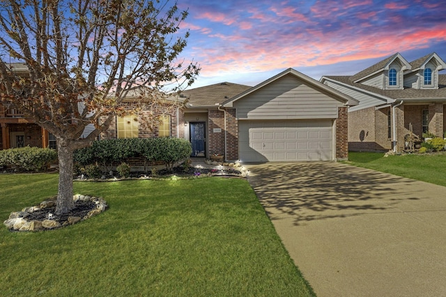 1028 Castle Top Dr, Fort Worth, TX 76052 - view of front of house featuring brick siding, a garage, concrete driveway, and a front yard