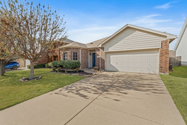 1028 Castle Top Dr, Fort Worth, TX 76052 - single story home featuring brick siding, concrete driveway, an attached garage, and a front lawn