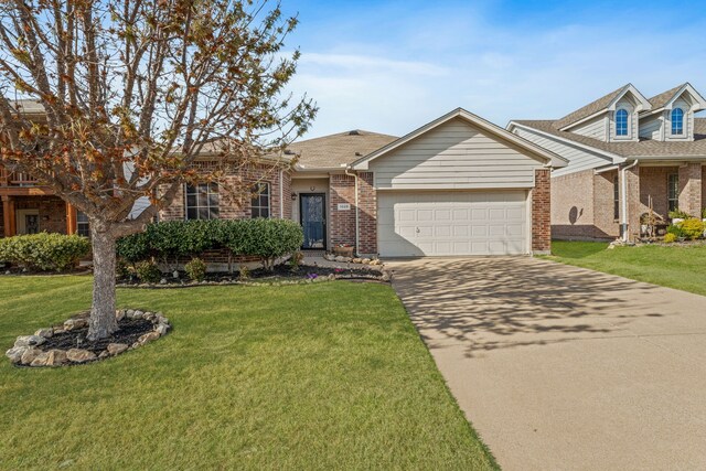1028 Castle Top Dr, Fort Worth, TX 76052 - view of front of property featuring brick siding, a garage, driveway, and a front lawn