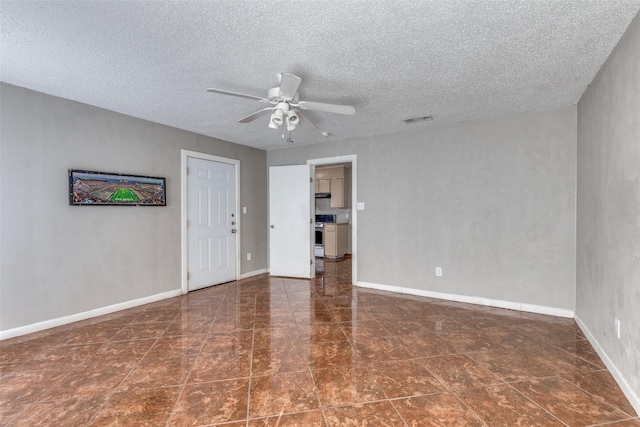 3816 Lauretta Dr, Fort Worth, TX 76119 - empty room with baseboards, a textured ceiling, ceiling fan, and visible vents