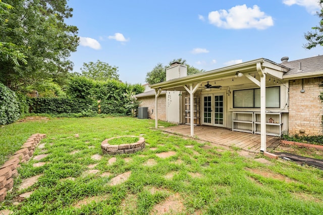3712 Chittam Ln, Bedford, TX 76021 - view of yard featuring french doors, a wooden deck, and ceiling fan