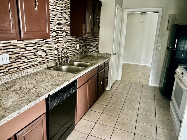 8805 N Normandale St, Fort Worth, TX 76116 - kitchen with a sink, freestanding refrigerator, tasteful backsplash, white range with electric cooktop, and black dishwasher