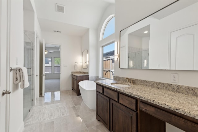 3612 Green Mountain Pl, Mckinney, TX 75070 - full bathroom with a stall shower, two vanities, a freestanding tub, a ceiling fan, and recessed lighting