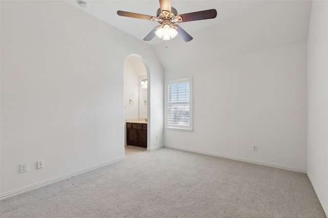 3612 Green Mountain Pl, Mckinney, TX 75070 - spare room with light carpet, ceiling fan, vaulted ceiling, arched walkways, and baseboards