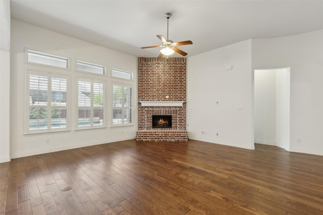 3612 Green Mountain Pl, Mckinney, TX 75070 - unfurnished living room with ceiling fan, hardwood / wood-style flooring, a fireplace, and baseboards