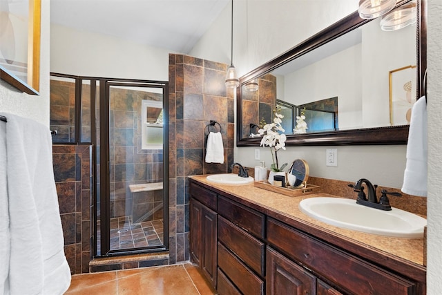 2357 S Branch Rd, Krum, TX 76249 - bathroom with a shower stall, double vanity, and tile patterned flooring
