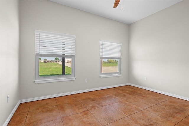 2357 S Branch Rd, Krum, TX 76249 - empty room with tile patterned flooring and a ceiling fan