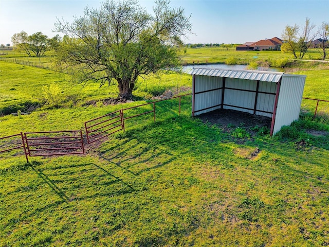 2357 S Branch Rd, Krum, TX 76249 - view of yard featuring a view of rural / pastoral area, an outbuilding, an outdoor structure, and a detached carport