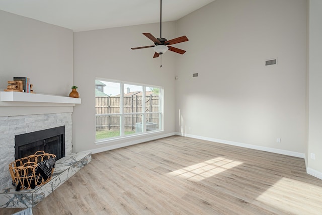 632 Albrook Dr, Allen, TX 75002 - unfurnished living room with high vaulted ceiling, a fireplace, wood finished floors, baseboards, and ceiling fan