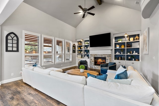 3510 Springbell St, Celina, TX 75009 - living room featuring dark wood-style flooring, high vaulted ceiling, a stone fireplace, baseboards, and a ceiling fan
