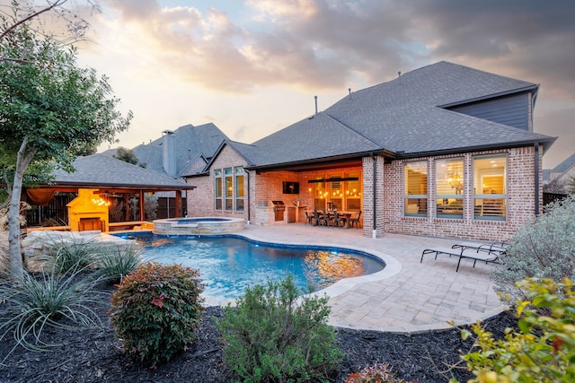 3510 Springbell St, Celina, TX 75009 - pool at dusk with a patio area, a gazebo, and a pool with connected hot tub