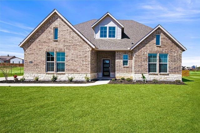 197 Spanish Moss Trl, Rhome, TX 76078 - view of front facade with brick siding and a shingled roof