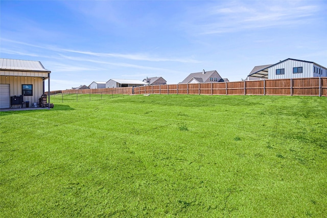 view of yard with fence