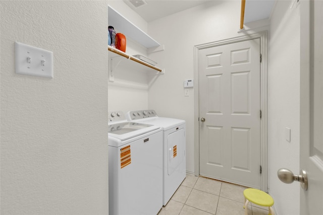 724 Darlington Trl, Fort Worth, TX 76131 - clothes washing area with independent washer and dryer and light tile patterned flooring