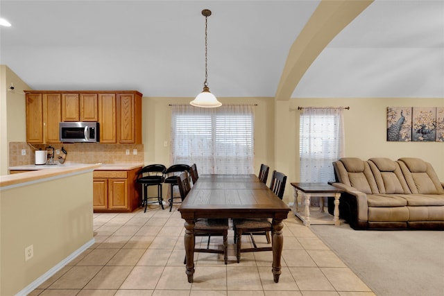 724 Darlington Trl, Fort Worth, TX 76131 - dining area with light tile patterned floors and lofted ceiling